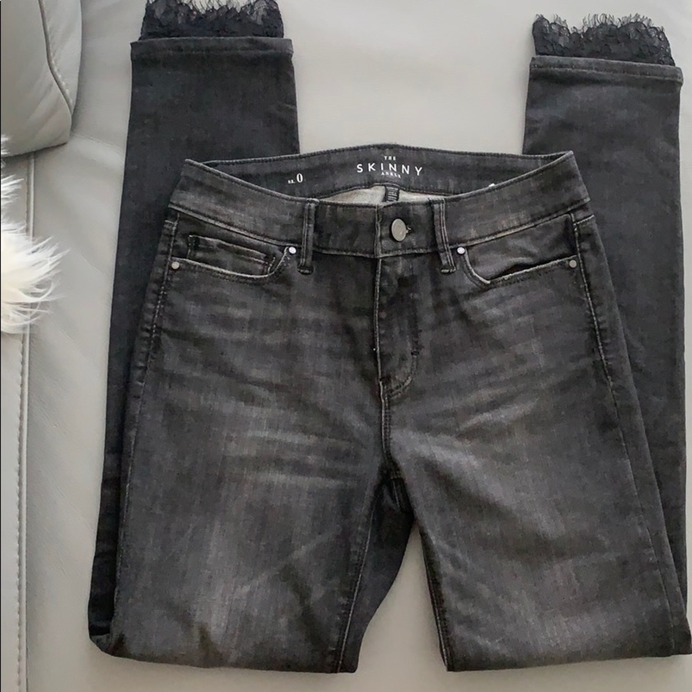 WHBM Classic rise lace-hem Skinny ankle jeans.